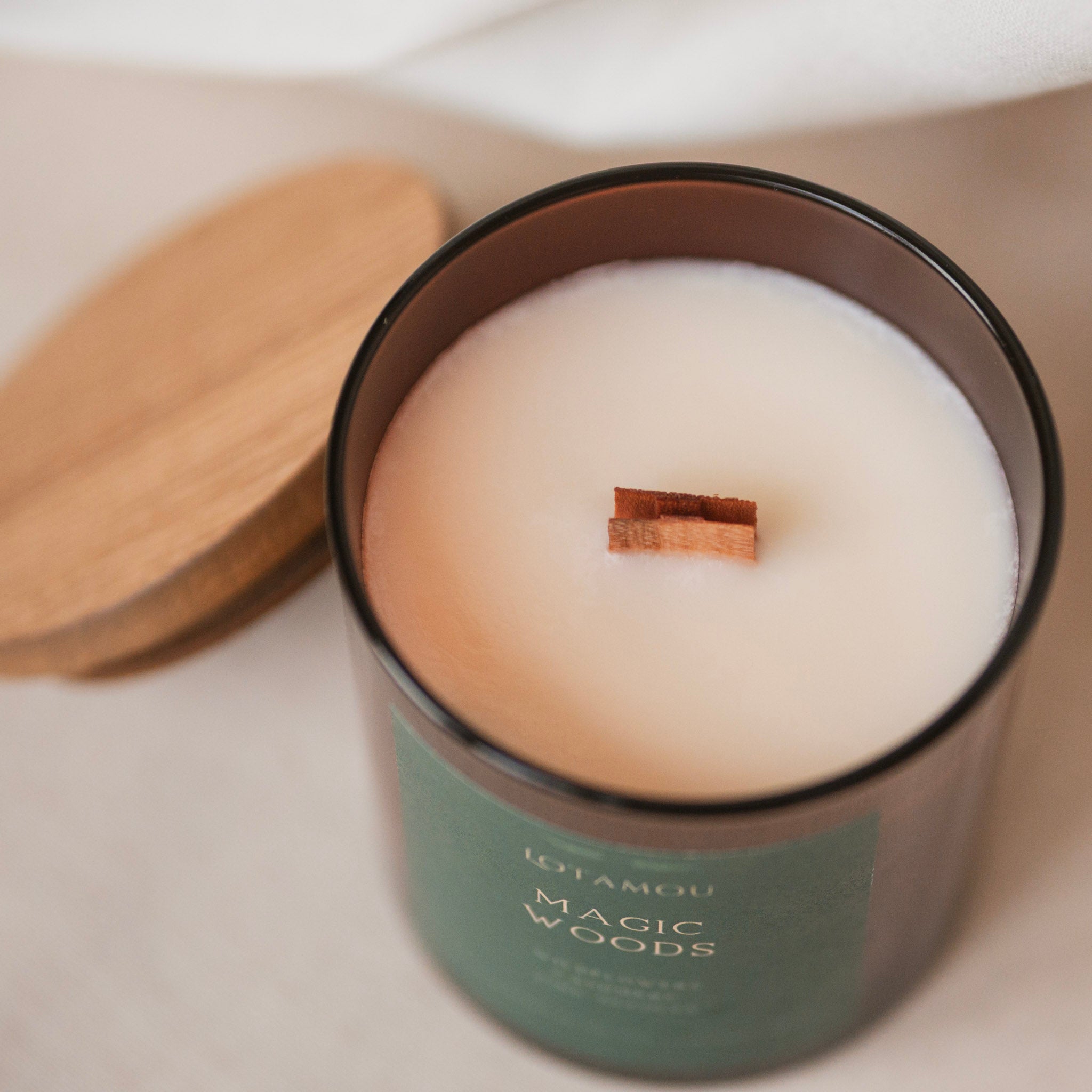Natural soy candle, scented with the fragrance of Enchanted Forest. Wooden wick and silicone-free lid.
