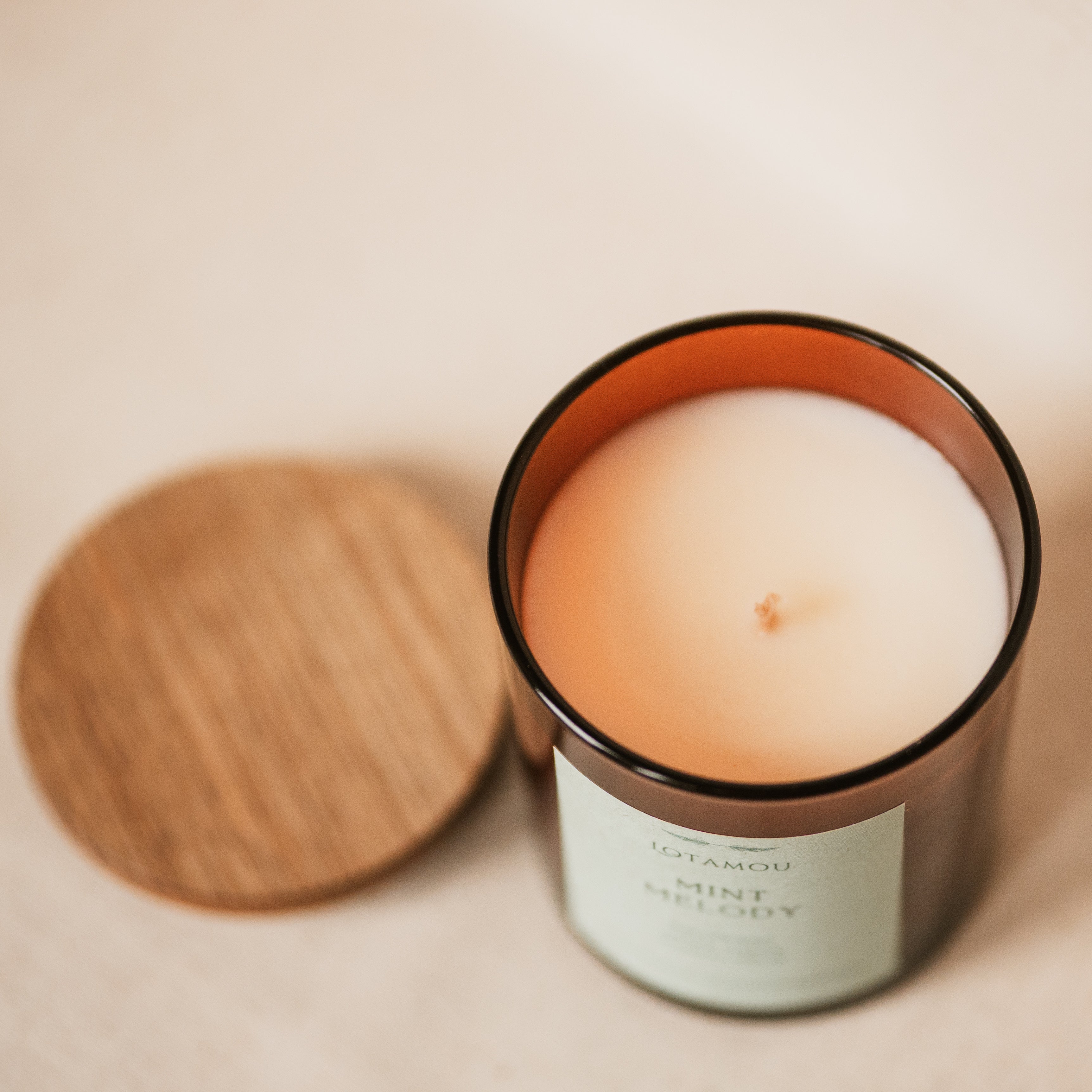 Mint scented candle in brown jar.  Natural fragrance oils,pure soy wax, silicone-free lid, cotton wick.