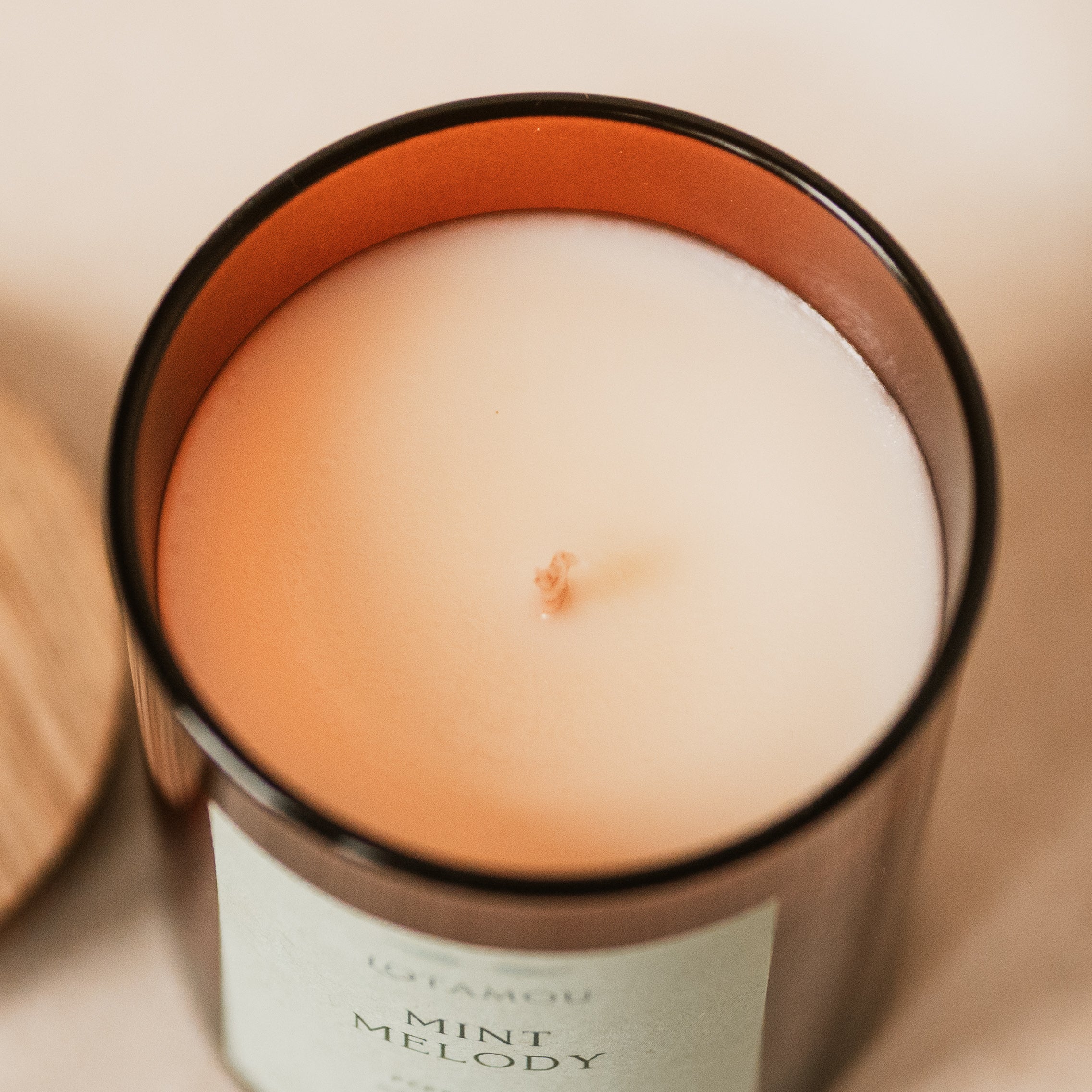 Mint scented candle in brown jar.  Natural fragrance oils,pure soy wax, silicone-free lid, cotton wick.